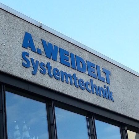 Firmenlogo an Außenfassade: A. Weidelt Systemtechnik